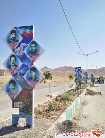 نصب تصاویر شهدای حاج عمران در بلوارهای شهرستان الیگودرز